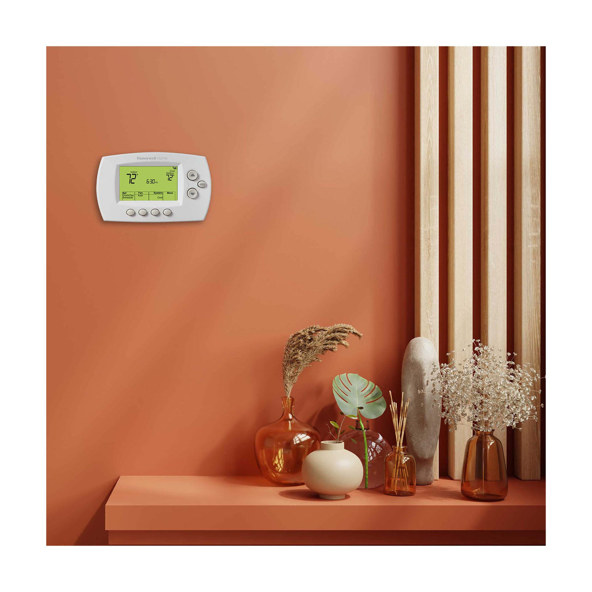 RTH6580WF Thermostat installed on wall