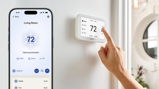 A smartphone displays the living room temperature on the Resideo Connect app. A hand is shown adjusting the temperature on a Honeywell Home smart thermostat.