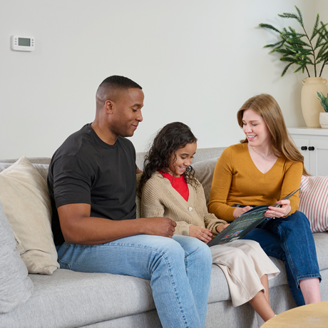 Family in living room relaxing comfortably