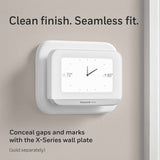White X7S thermostat with white wall plate to cover old marks